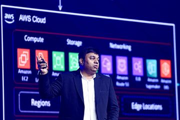 Prashant Akhawat presenting an AWS Cloud architecture slide at AWS Summit Mumbai 2025.