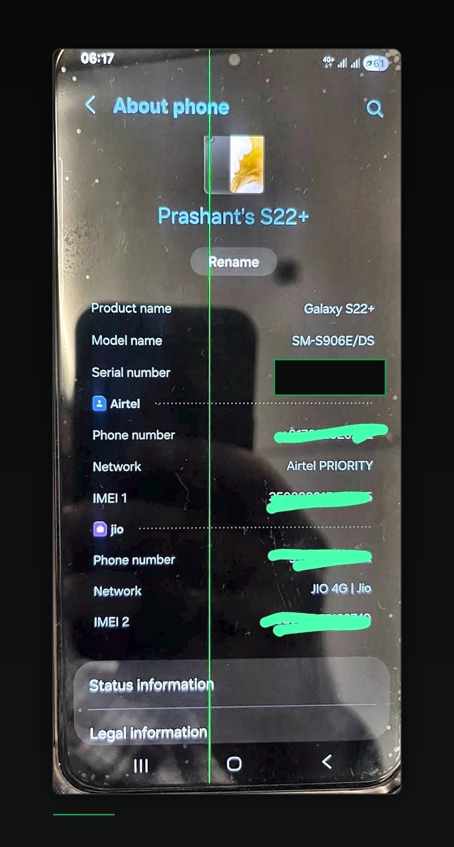 The author's Galaxy S22 Plus, model SM-S906E, photographed on the About phone screen with a permanent green line running the full height of the display