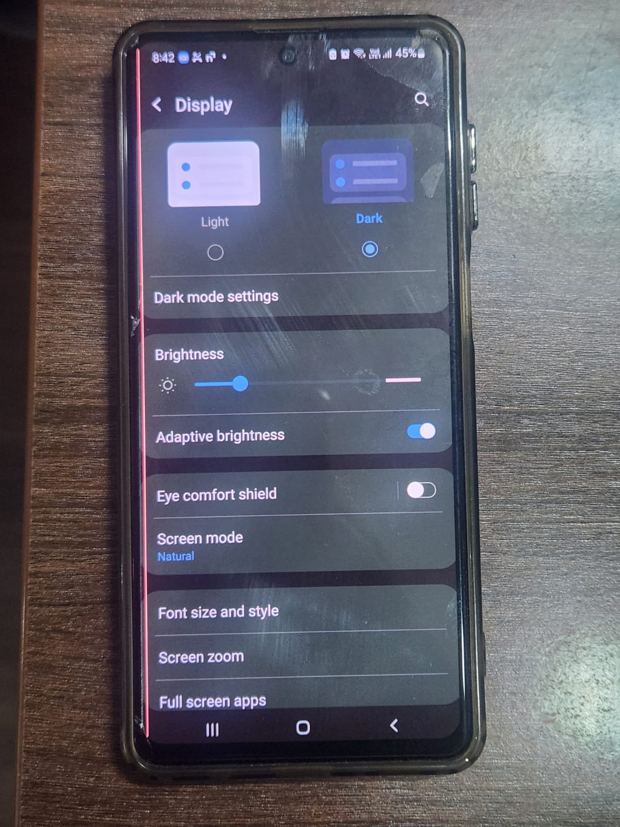 The same Galaxy M51 on the Display settings screen, with the pink line persisting in the same position